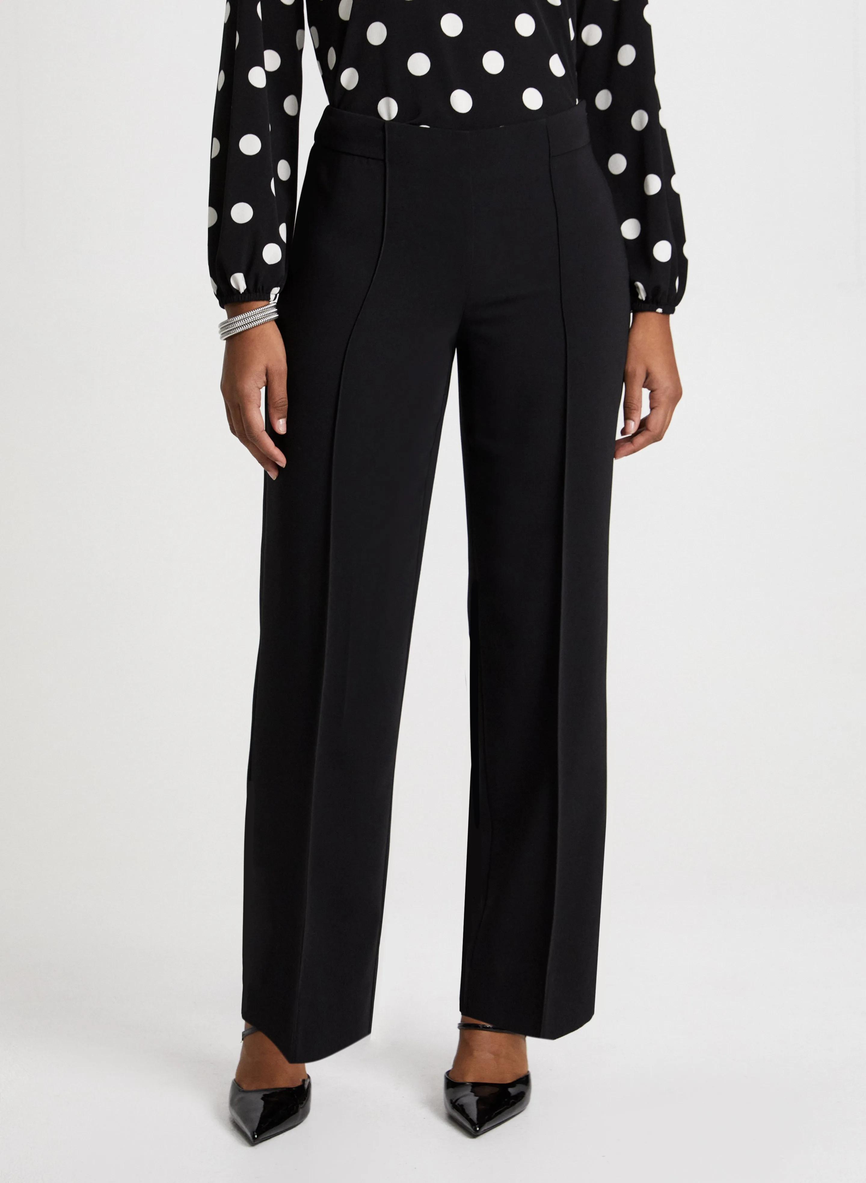 Modern Fit Wide Leg Pants sold by Laura