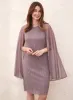 Metallic Plisse Cape Dress sold by Laura