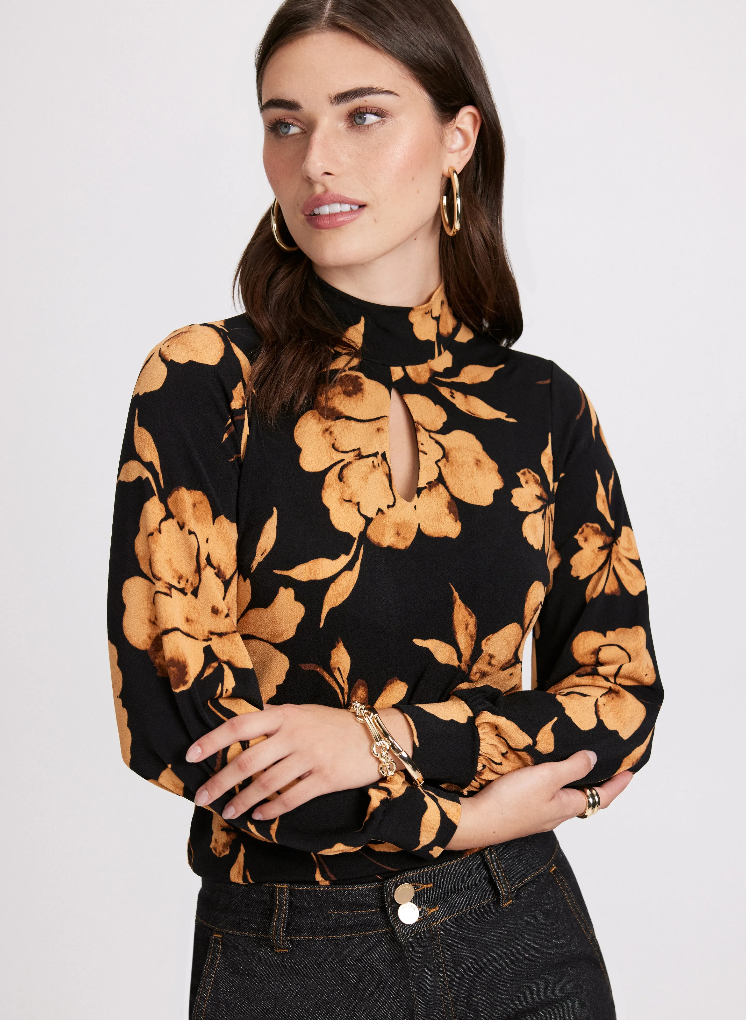 Floral Mock Neck Top sold by Laura