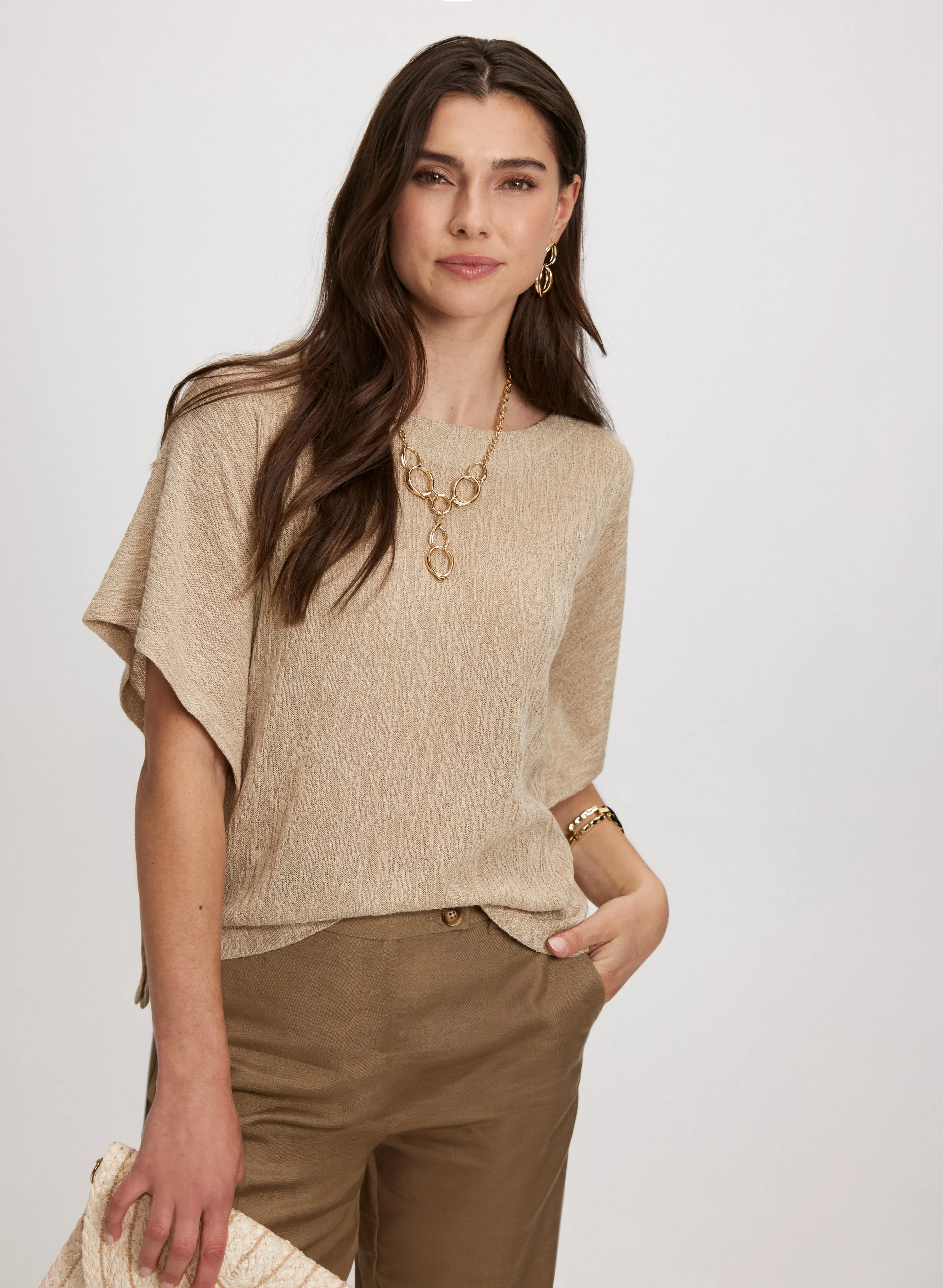 Flared Sleeve Knit Top sold by Laura