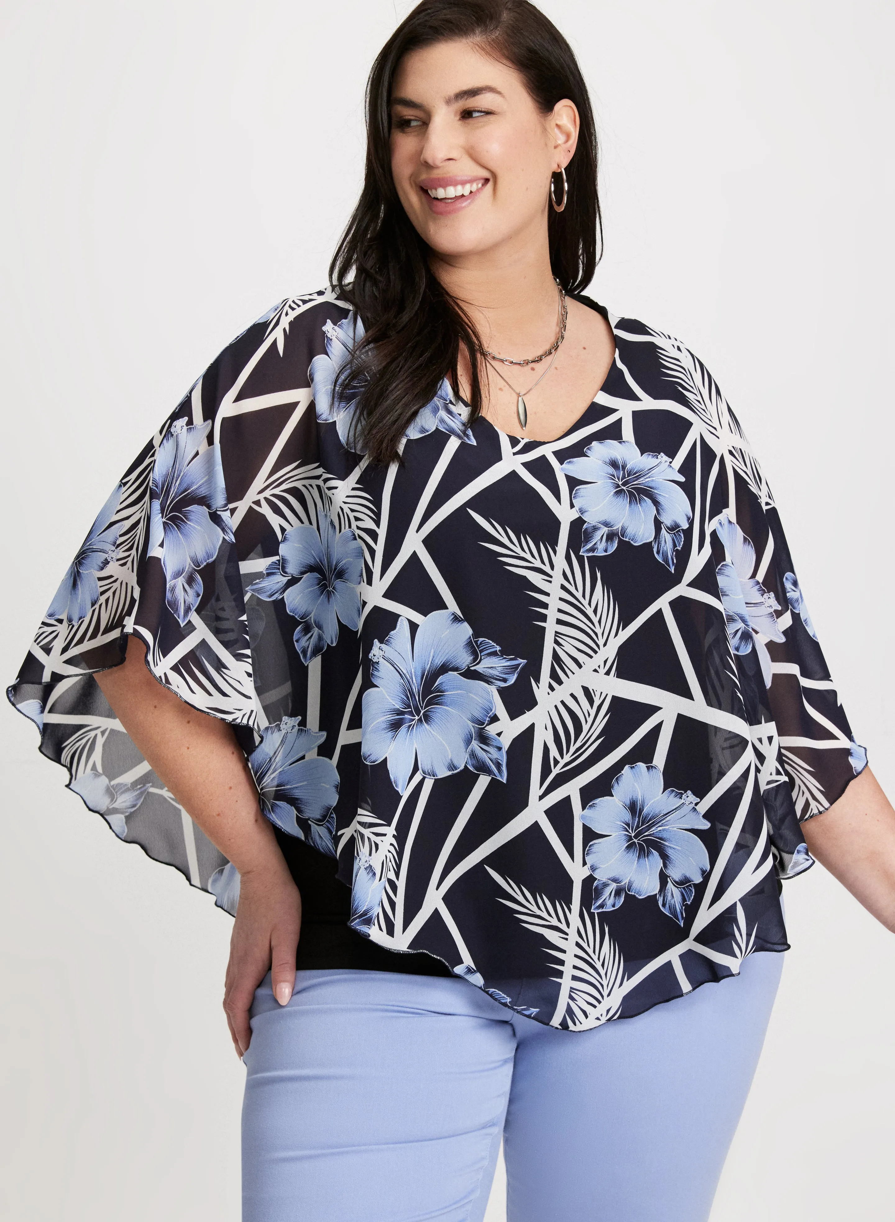 3/4 Sleeve Floral Poncho Blouse sold by Laura
