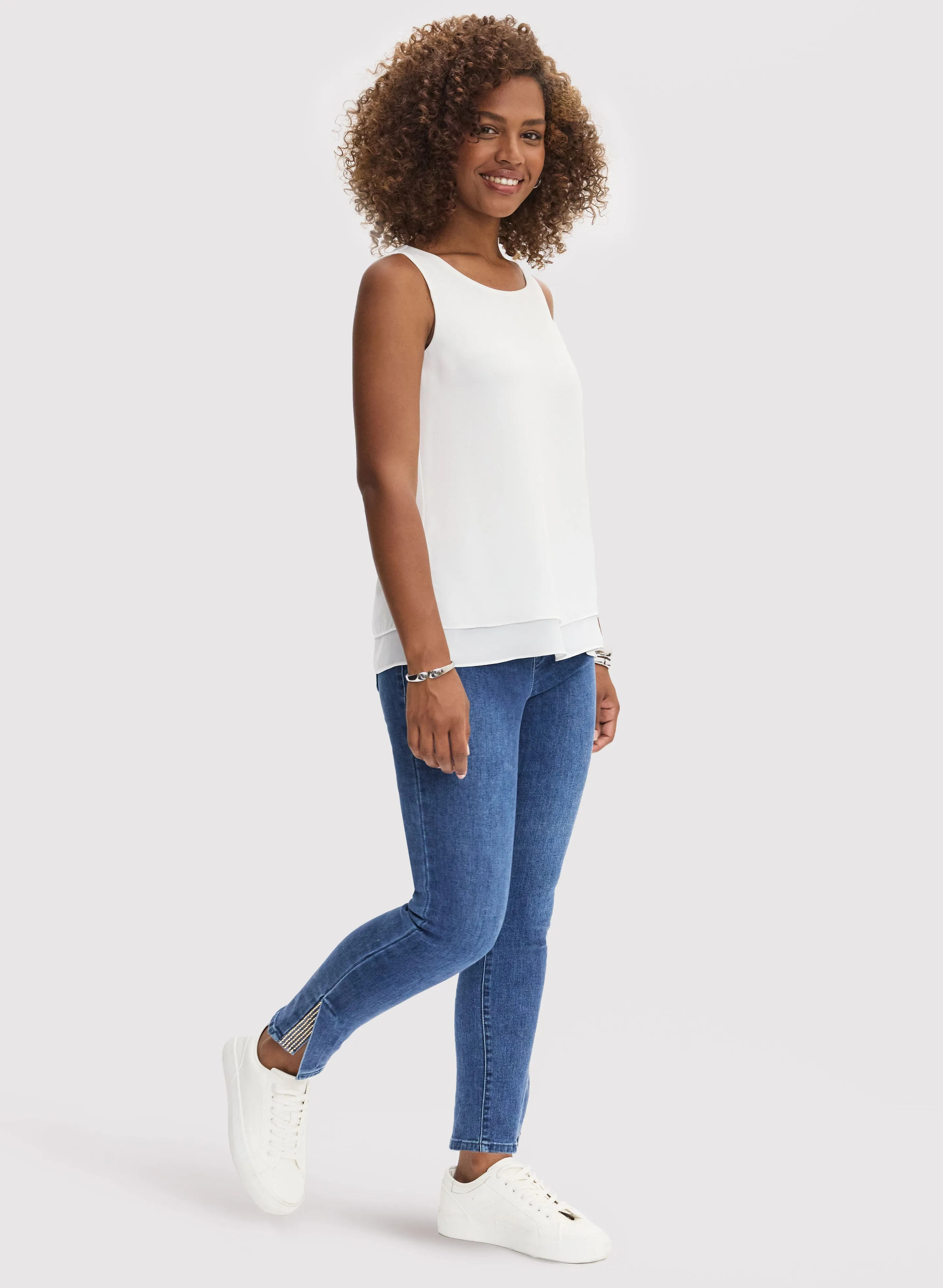 Sleeveless Blouse & Hem Slit Jeans sold by Laura