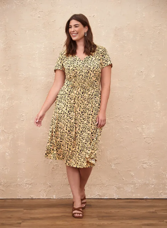 Abstract Print Smocked Midi Dress sold by Laura