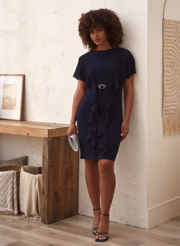 Cascading Ruffle Capelet Dress sold by Laura