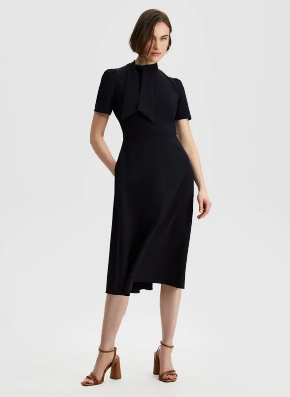 Puff Sleeve Tie Neck Dress sold by Laura