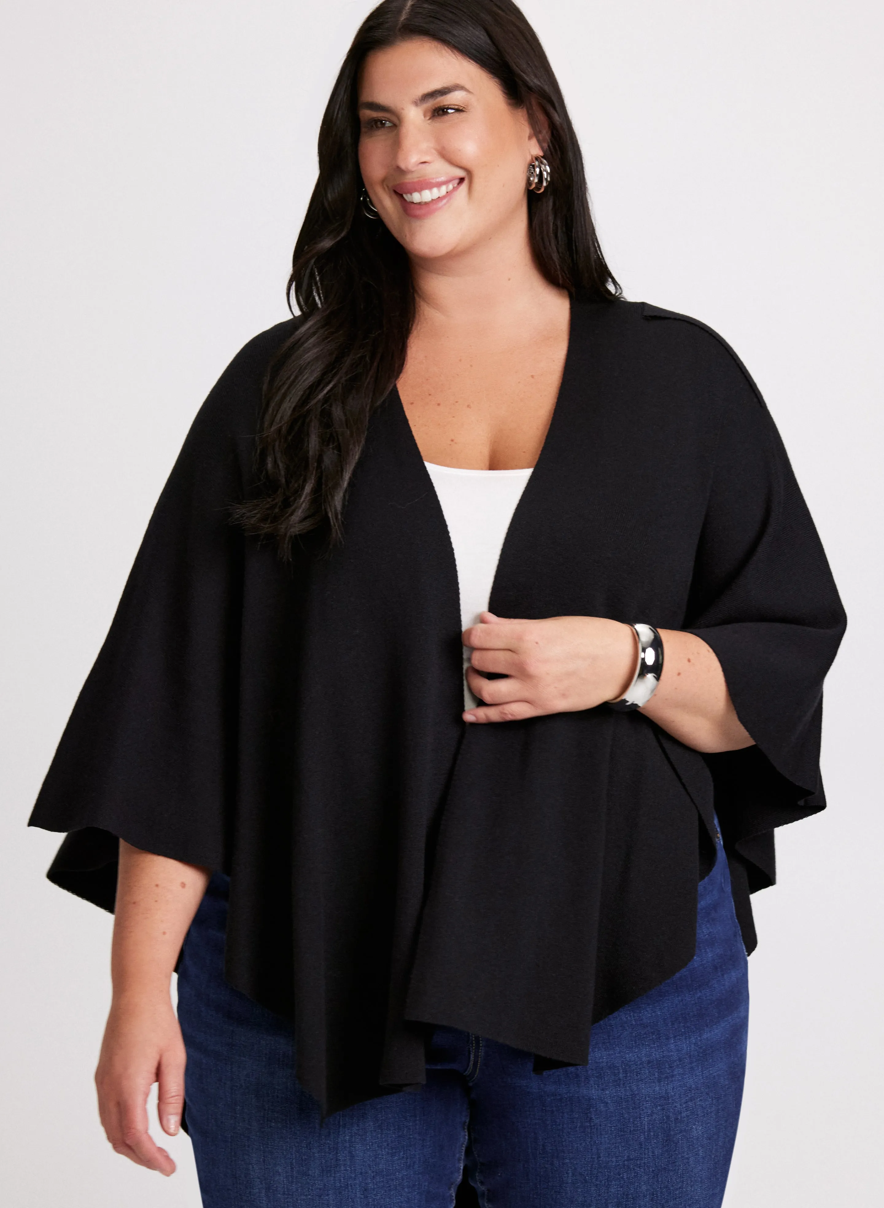 Pull-Through Detail Poncho sold by Laura