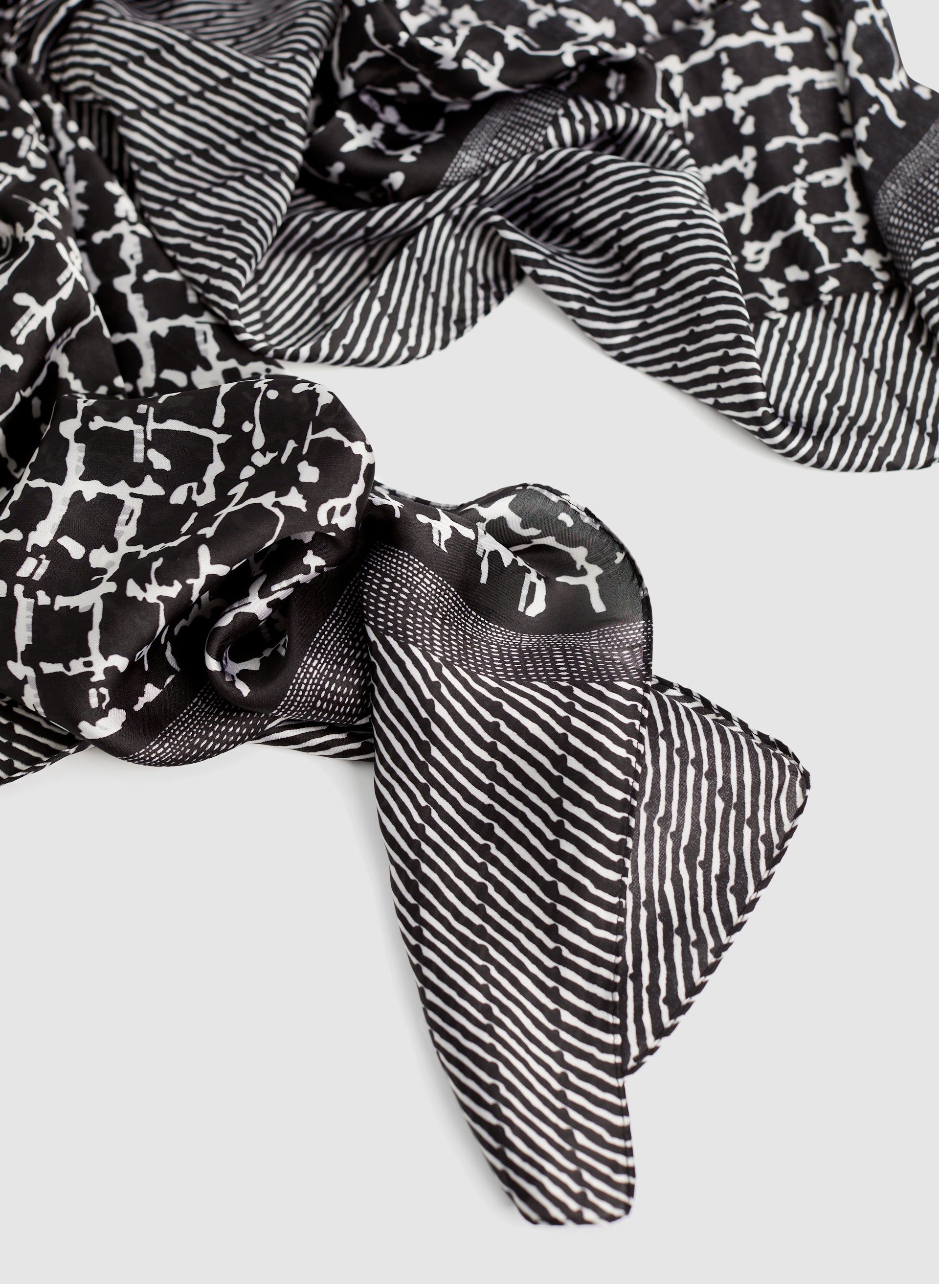 Grid Print Scarf sold by Laura