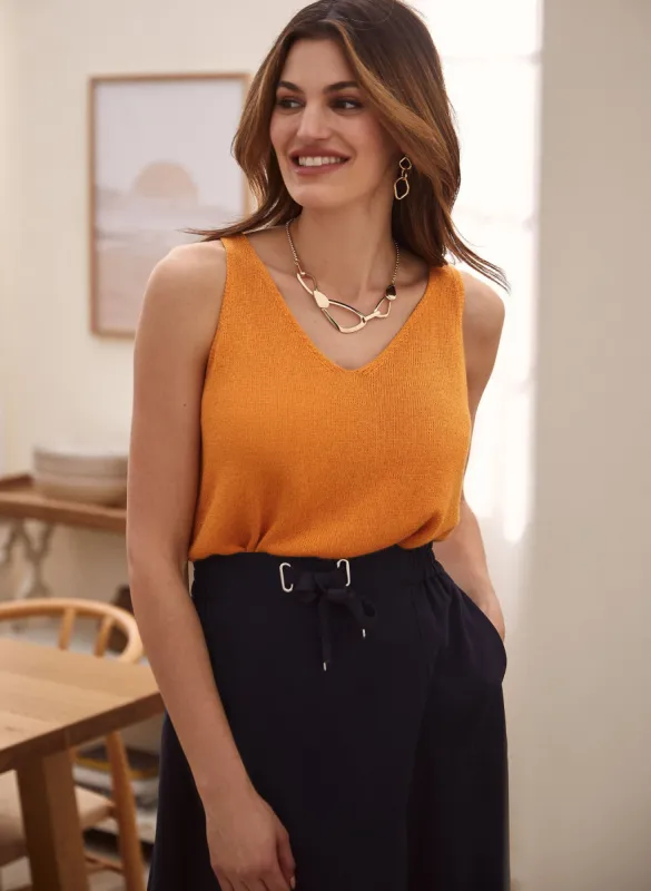 Glitter Sleeveless Sweater sold by Laura