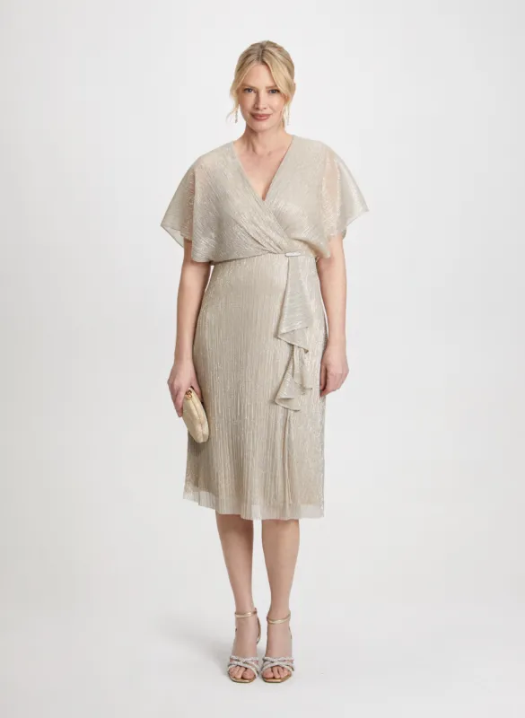 Metallic Dress & Glitter Clutch sold by Laura