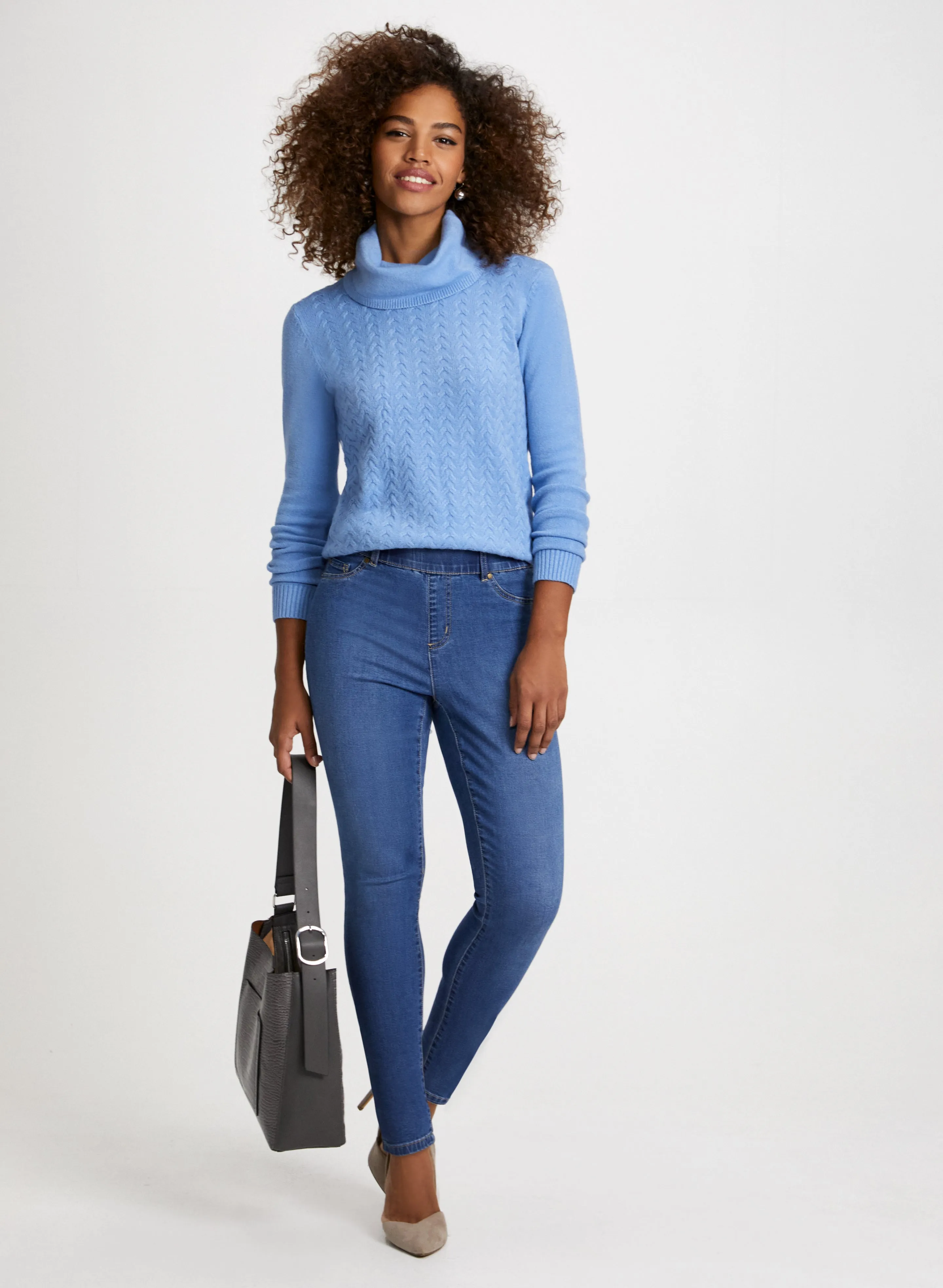 Cable Knit Sweater & Slim Leg Jeans sold by Laura