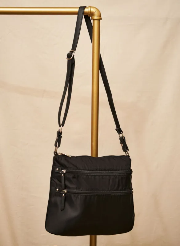 Multi Zipper Crossbody Bag sold by Laura