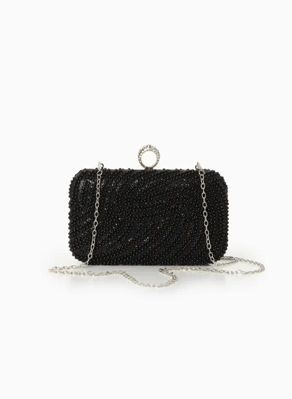 Pearl-Adorned Clutch sold by Laura