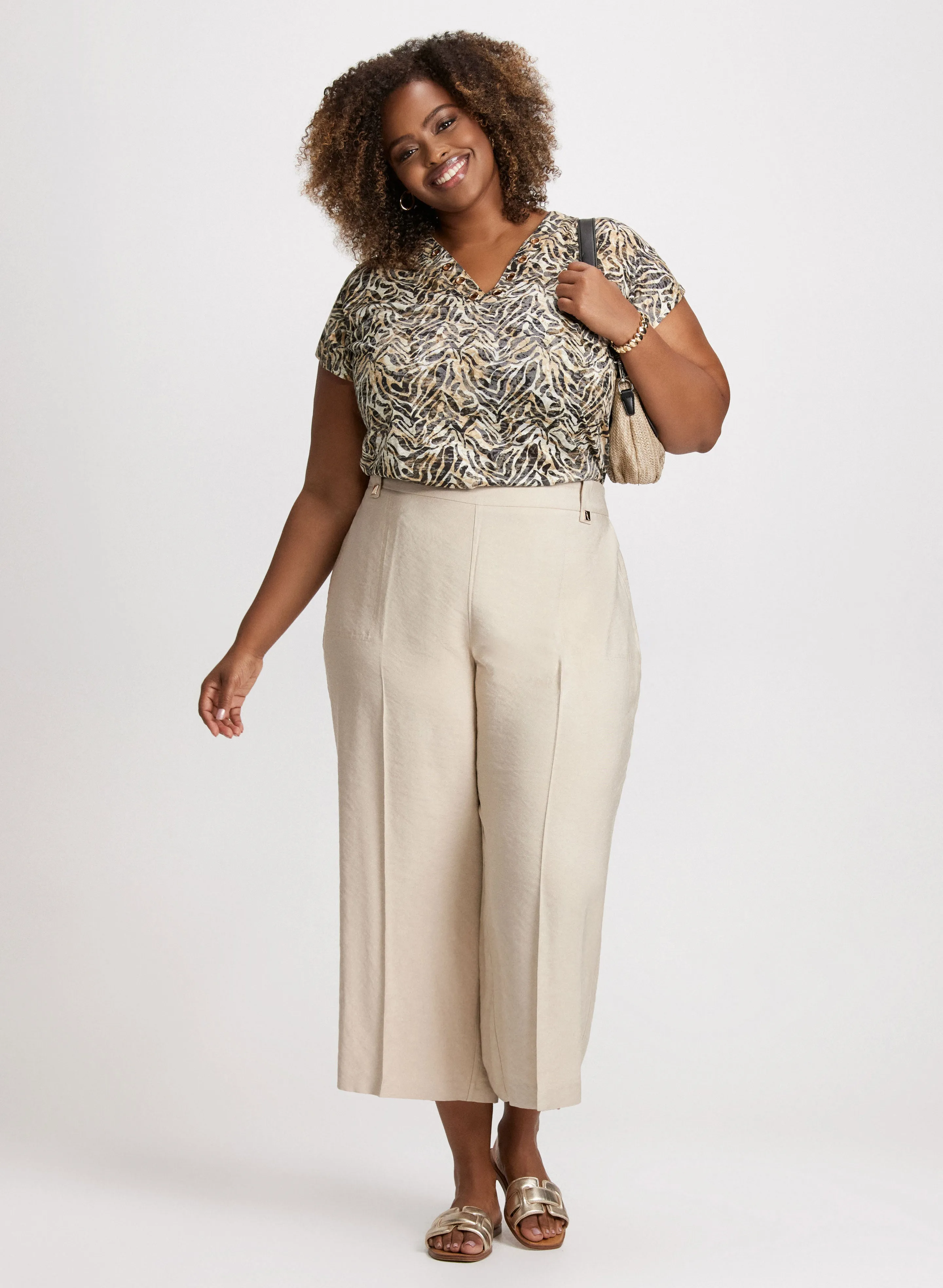 Animal Print Eyelet Tee & Pull-On Straight Leg Capris sold by Laura