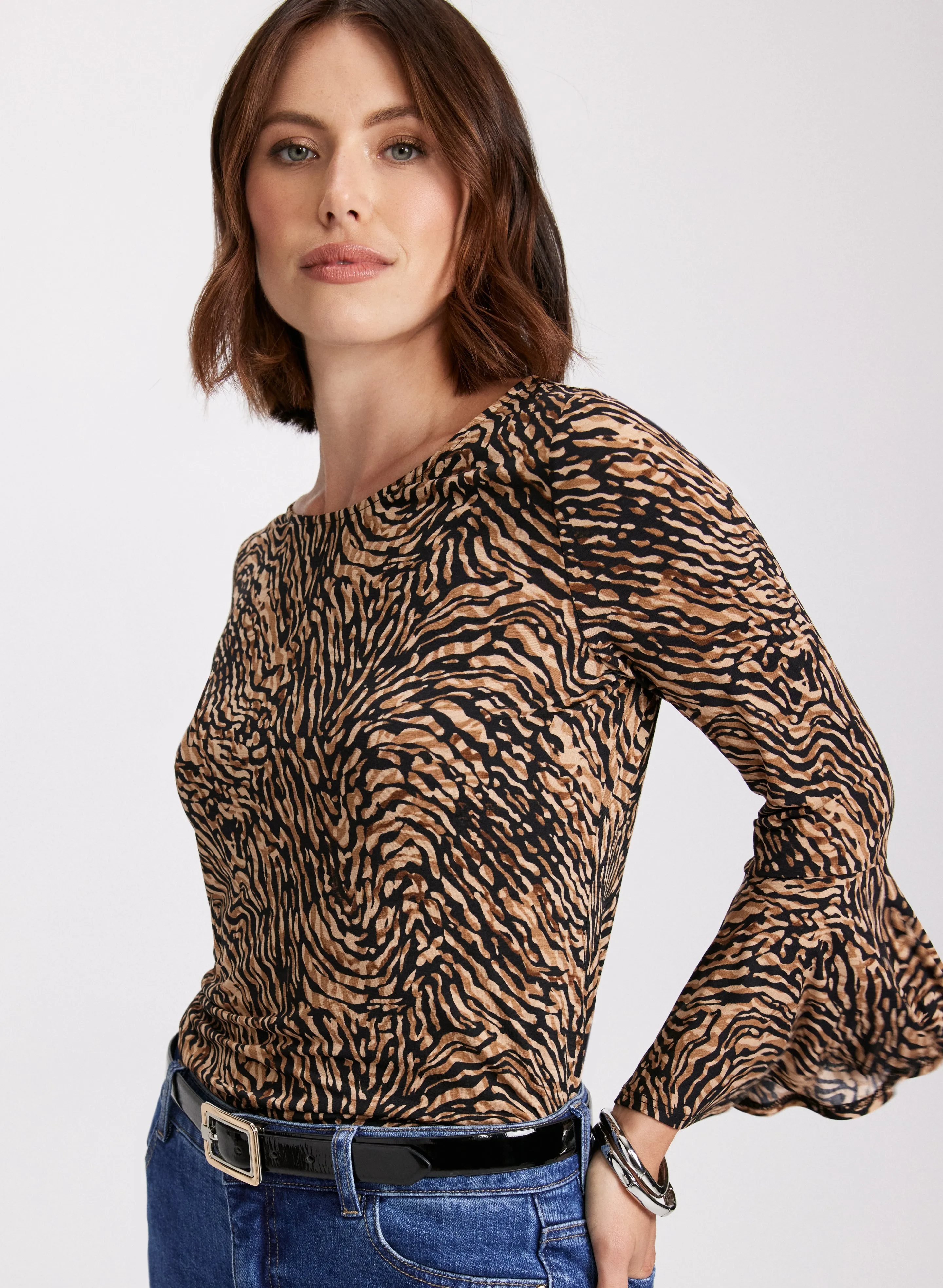 Animal Print Flared Sleeve Top sold by Laura