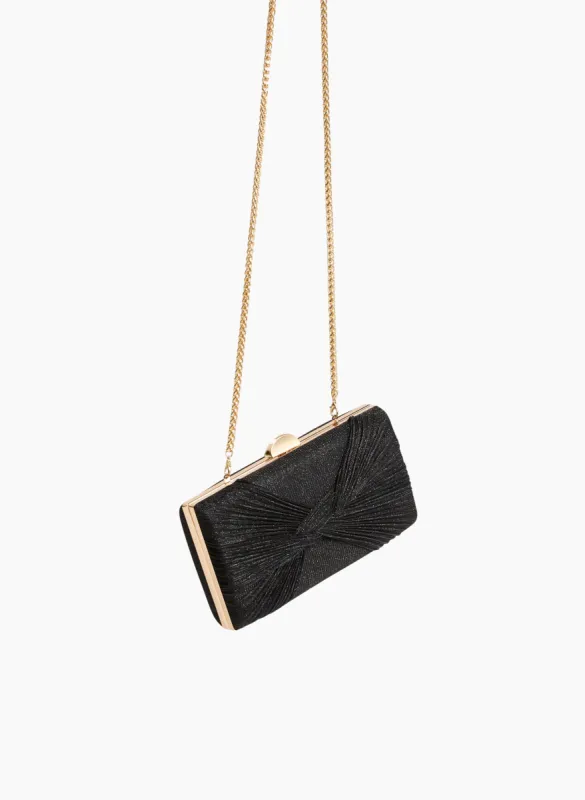 Drape Effect Shimmery Clutch sold by Laura