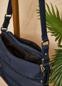 Multi Zipper Crossbody Bag sold by Laura