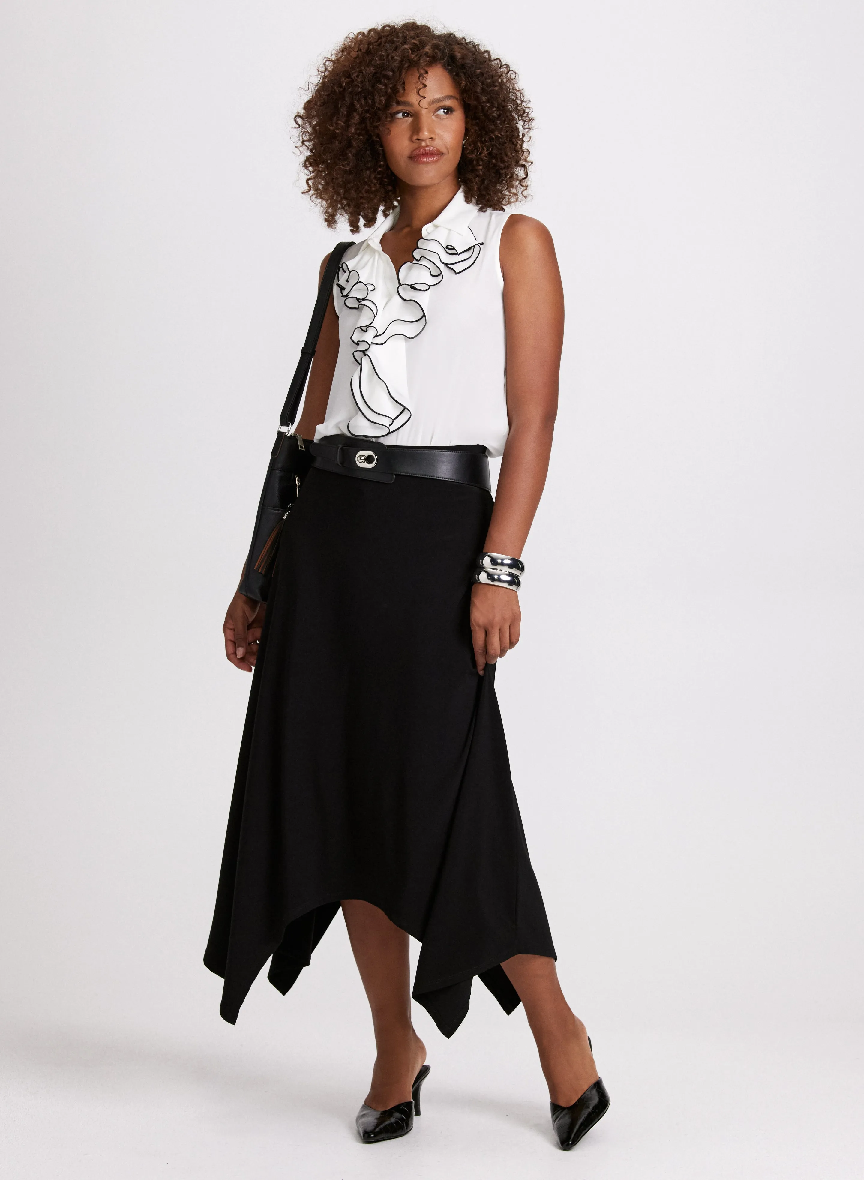 Ruffled Sleeveless Blouse & Asymmetric Hem Skirt sold by Laura