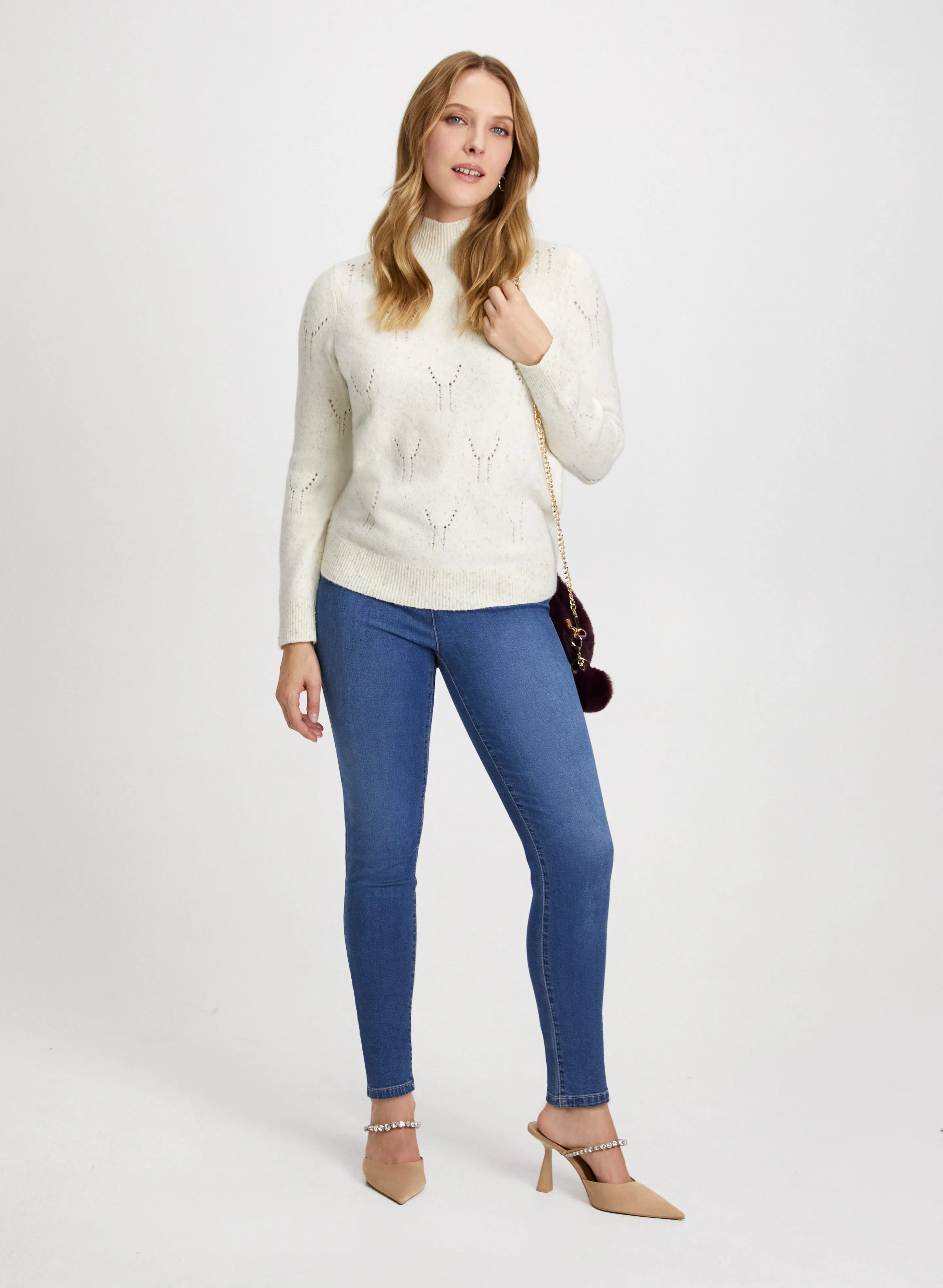 Pointelle Knit Sweater & Slim Leg Jeans sold by Laura