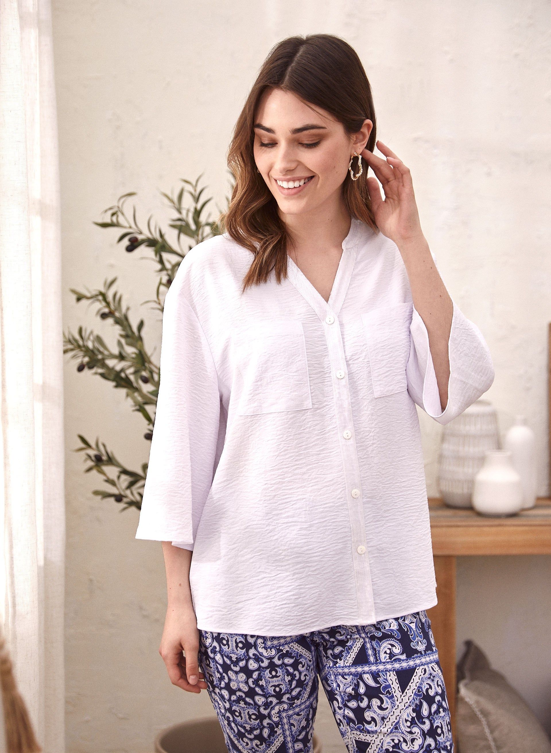 Sequin Detail V-Neck Blouse sold by Laura