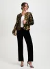 Sequin Jacket & Velour Pants sold by Laura