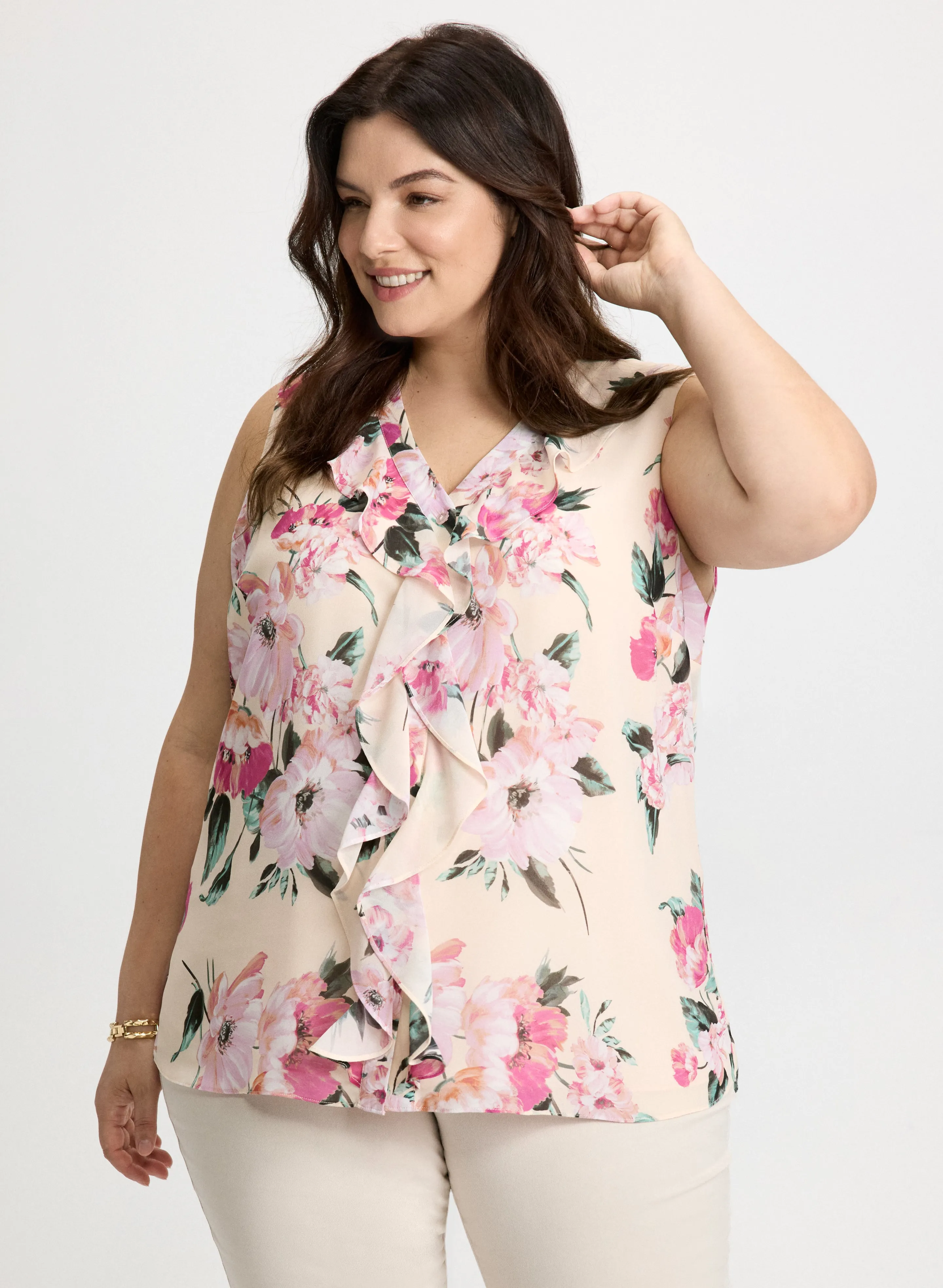 Ruffle Front Floral Blouse sold by Laura