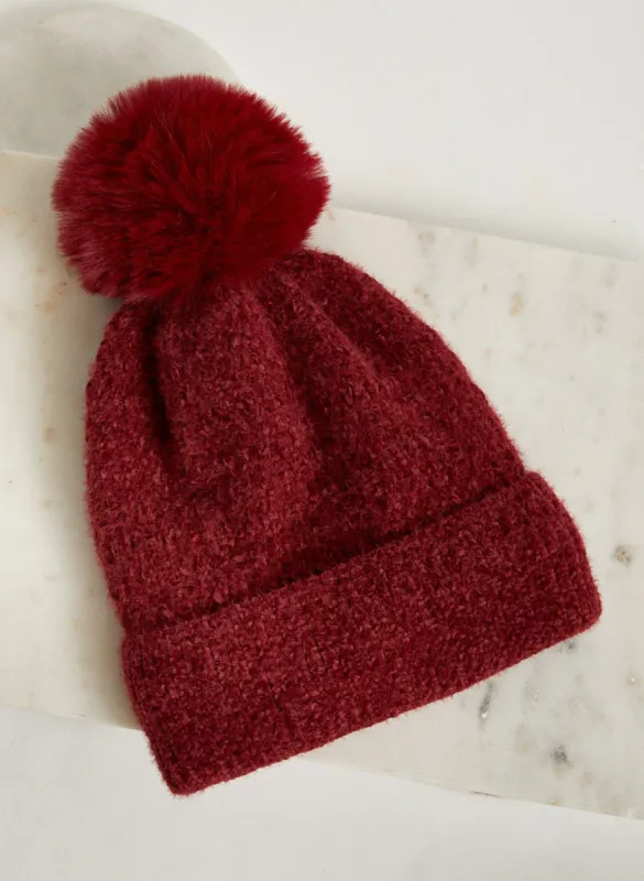 Removable Pom Pom Knit Hat sold by Laura