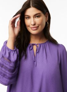 Puff Sleeve Embroidered Top sold by Laura