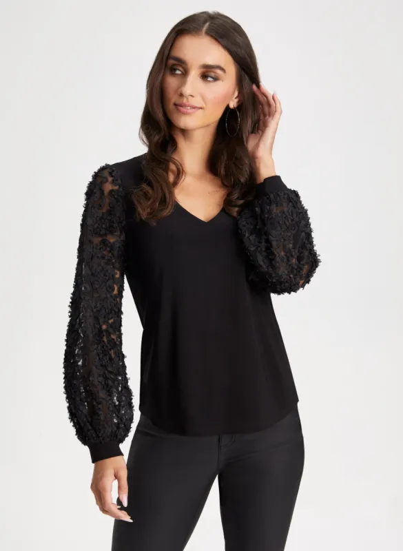 Embroidered Bouffant Sleeve Top sold by Laura