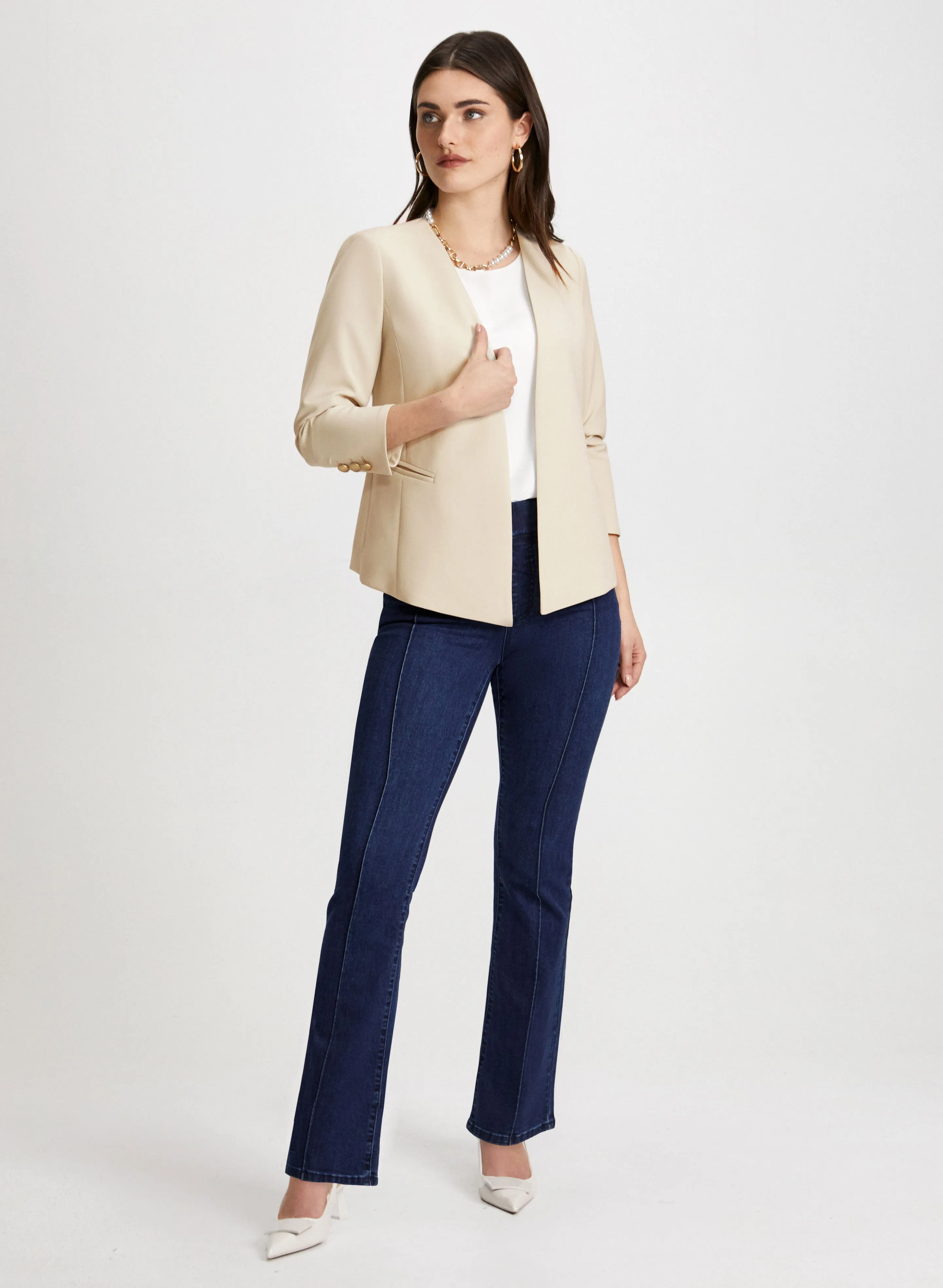 Asymmetric Jacket & Bootcut Jeans sold by Laura