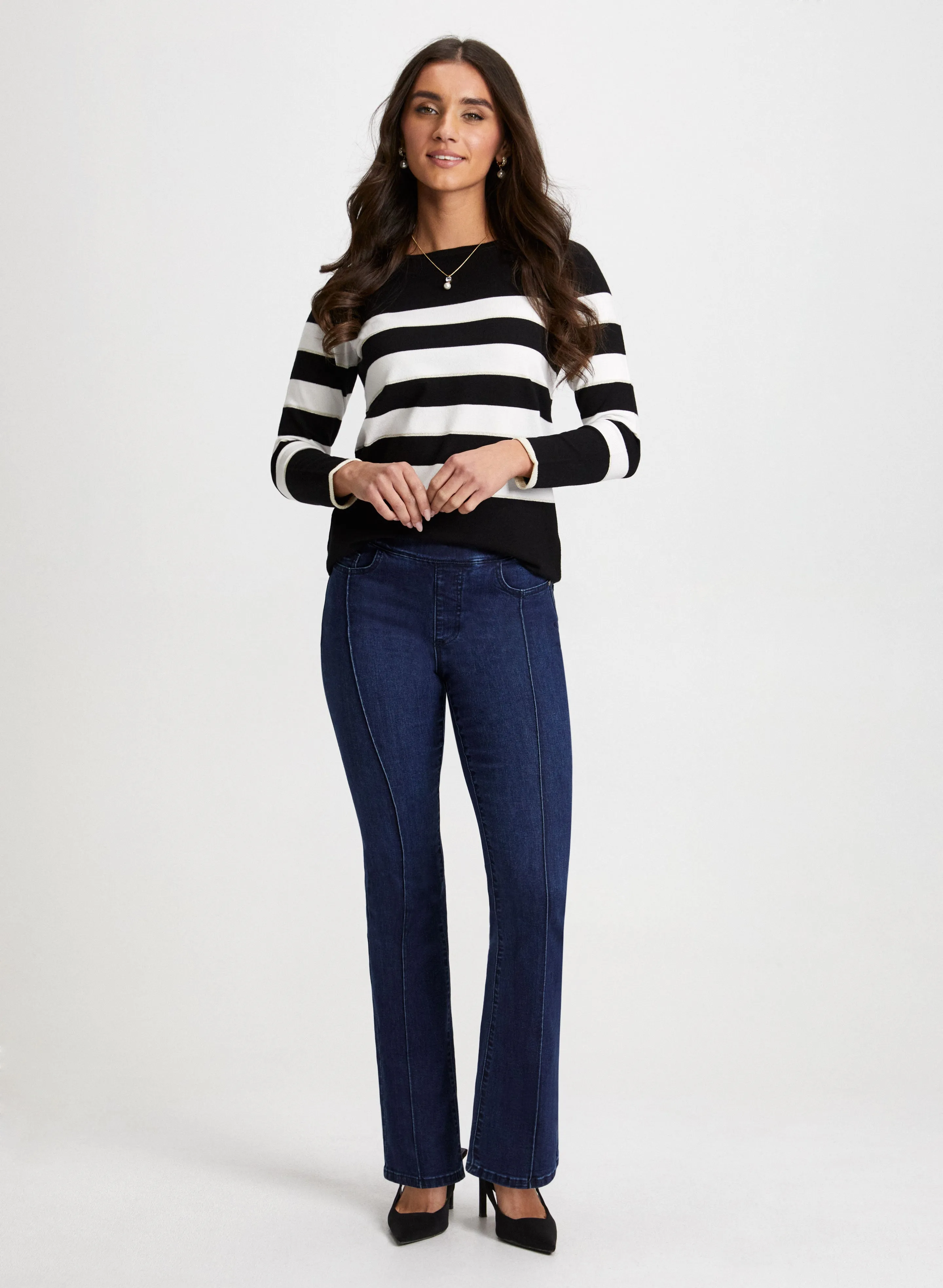 Striped Sweater & Bootcut Jeans sold by Laura
