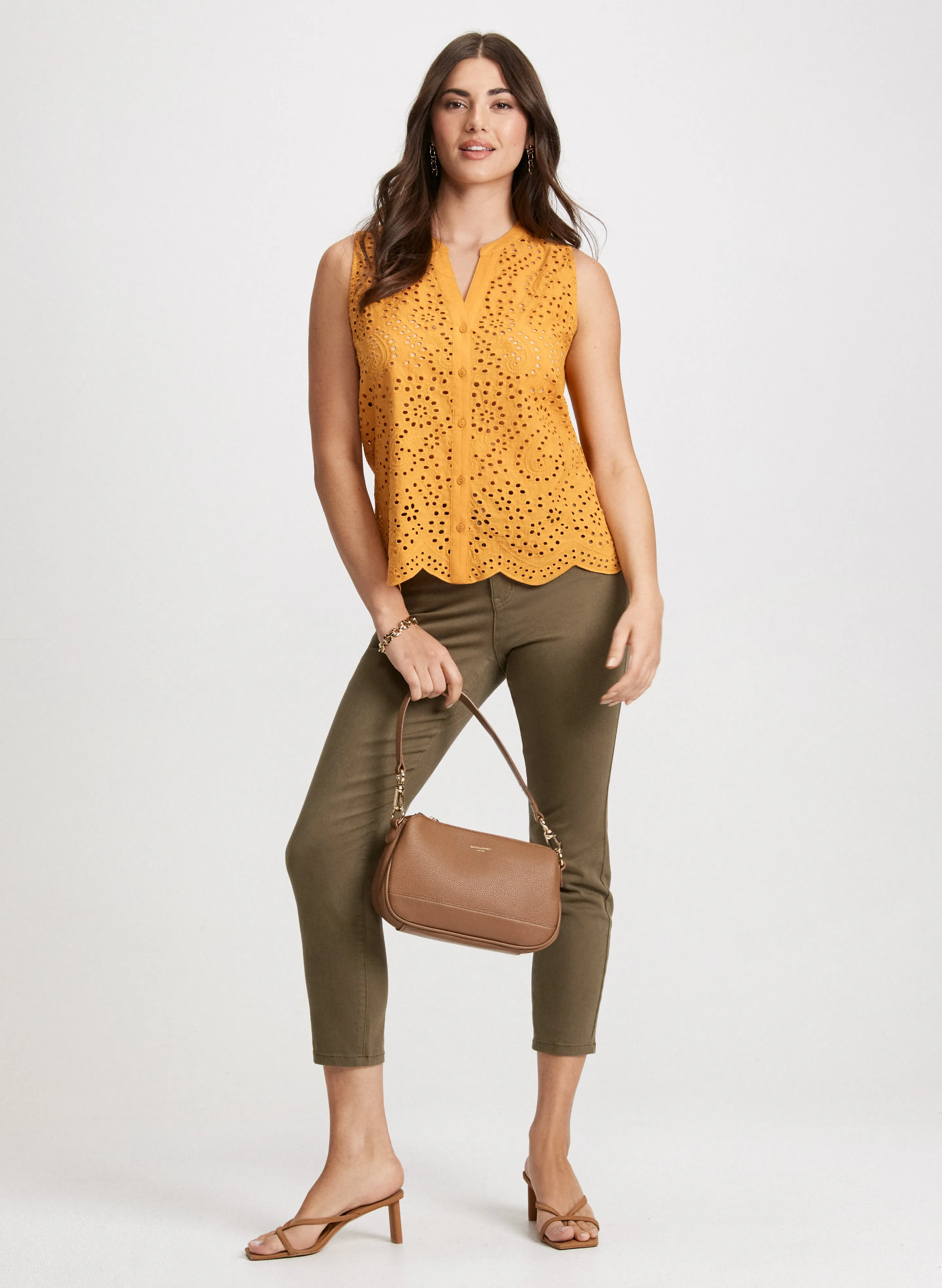 Eyelet Blouse & Slim Leg Jeans sold by Laura