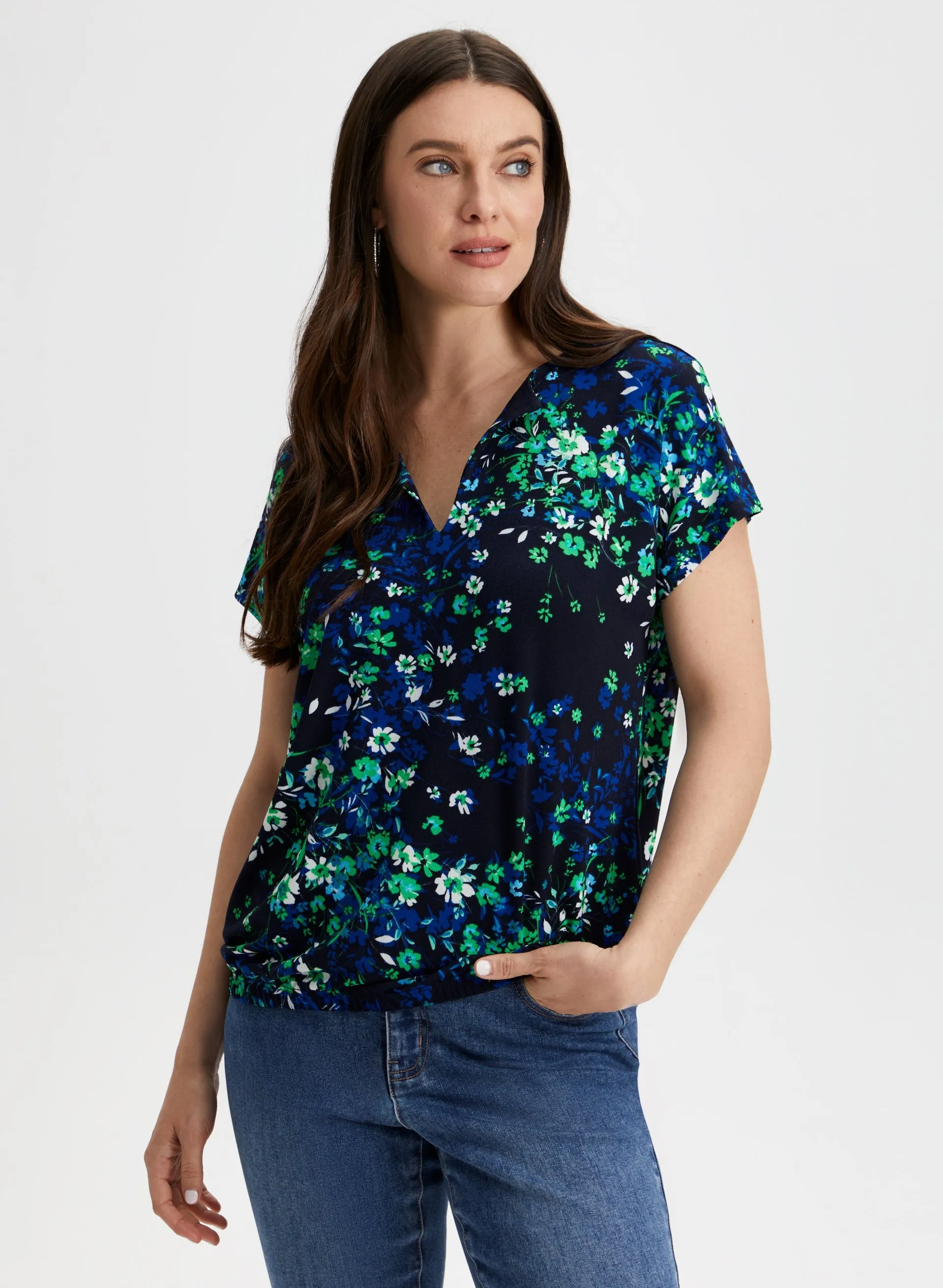 Floral Flutter Sleeve Top sold by Laura