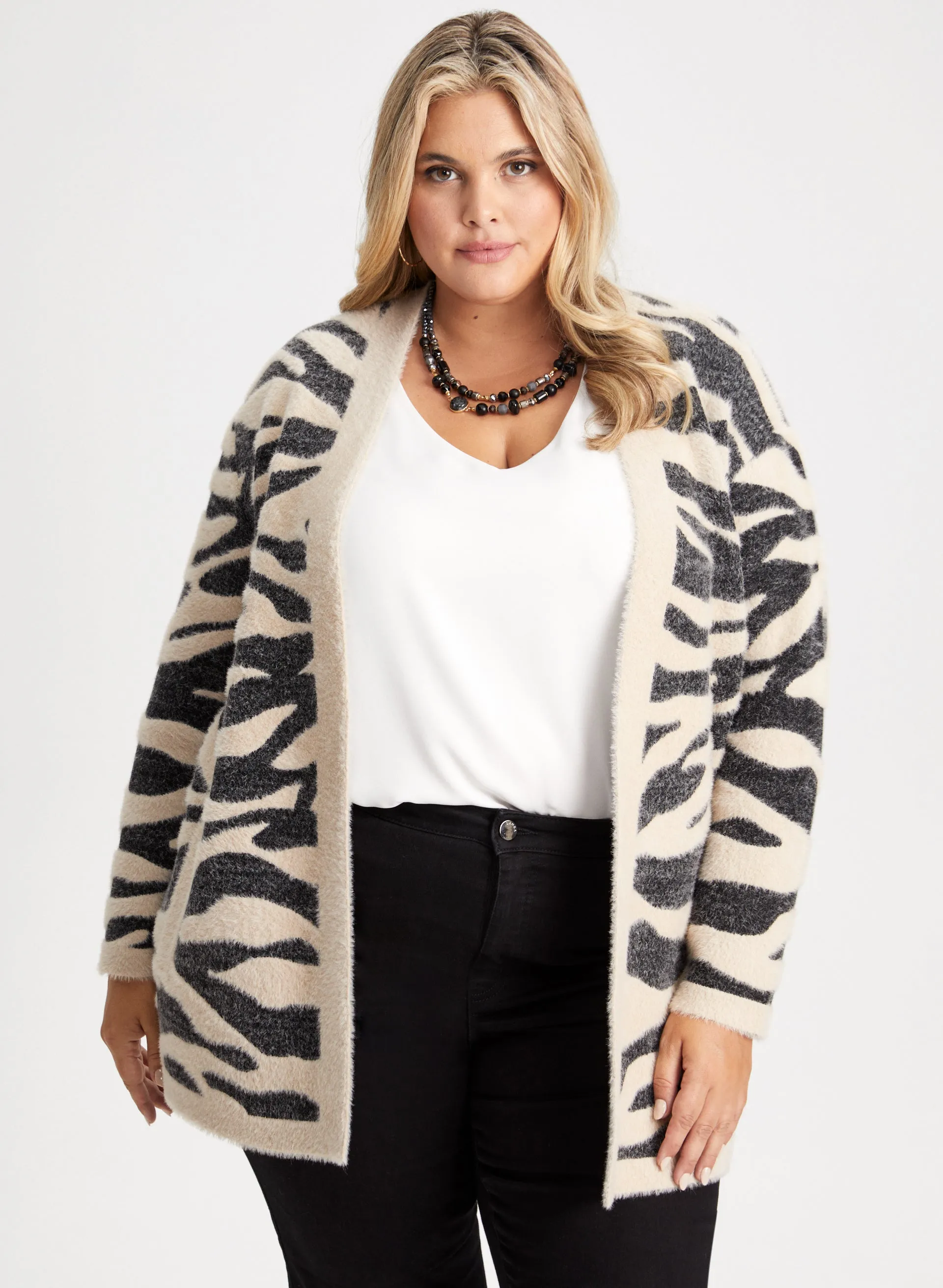 Zebra Print Cardigan sold by Laura
