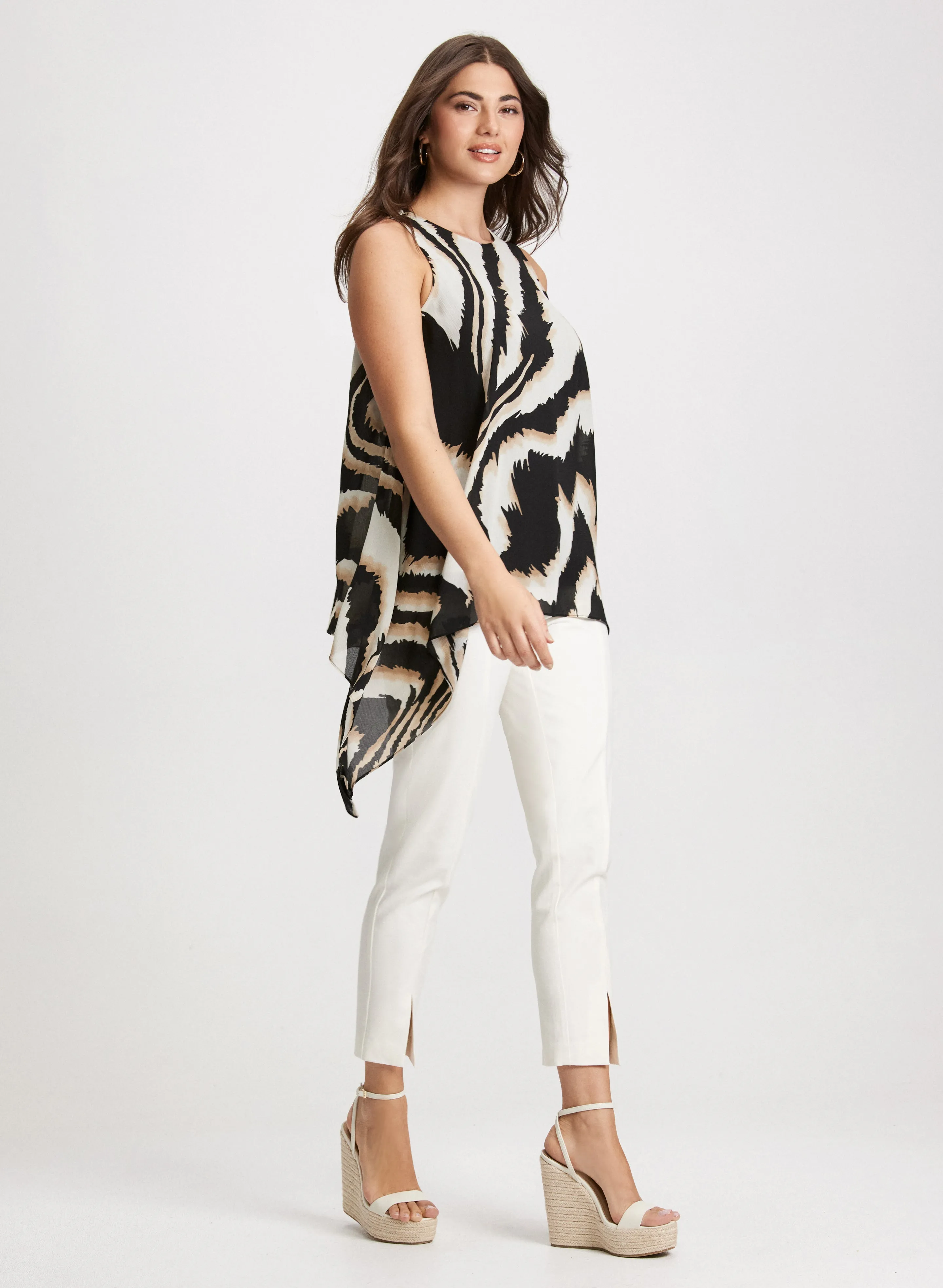 Zebra Asymmetric Blouse & Front Slit Pants sold by Laura