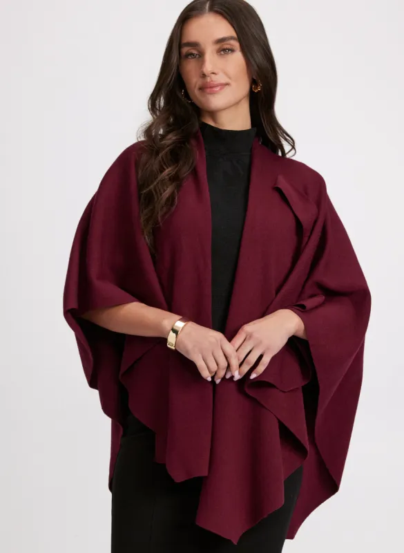 Pull-Through Detail Poncho sold by Laura