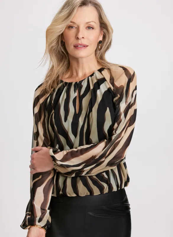 Zebra Print Blouse sold by Laura