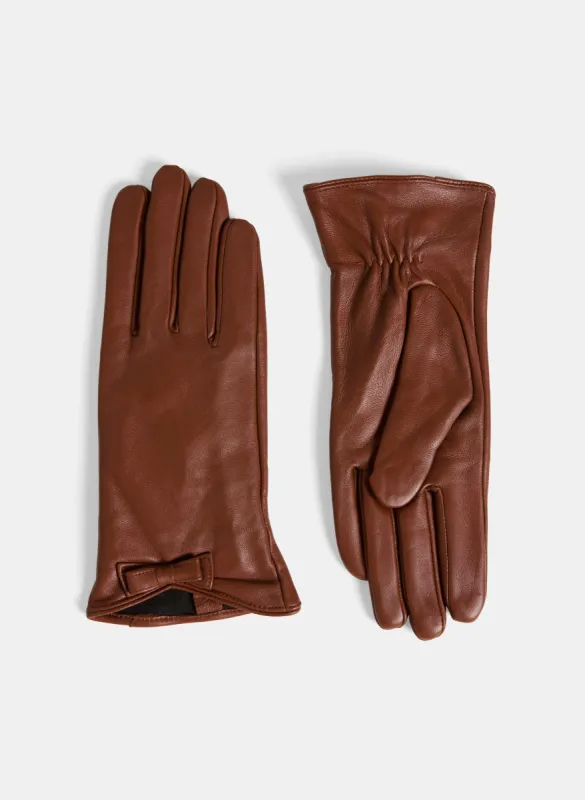 Decorative Bow Vegan Leather Gloves sold by Laura