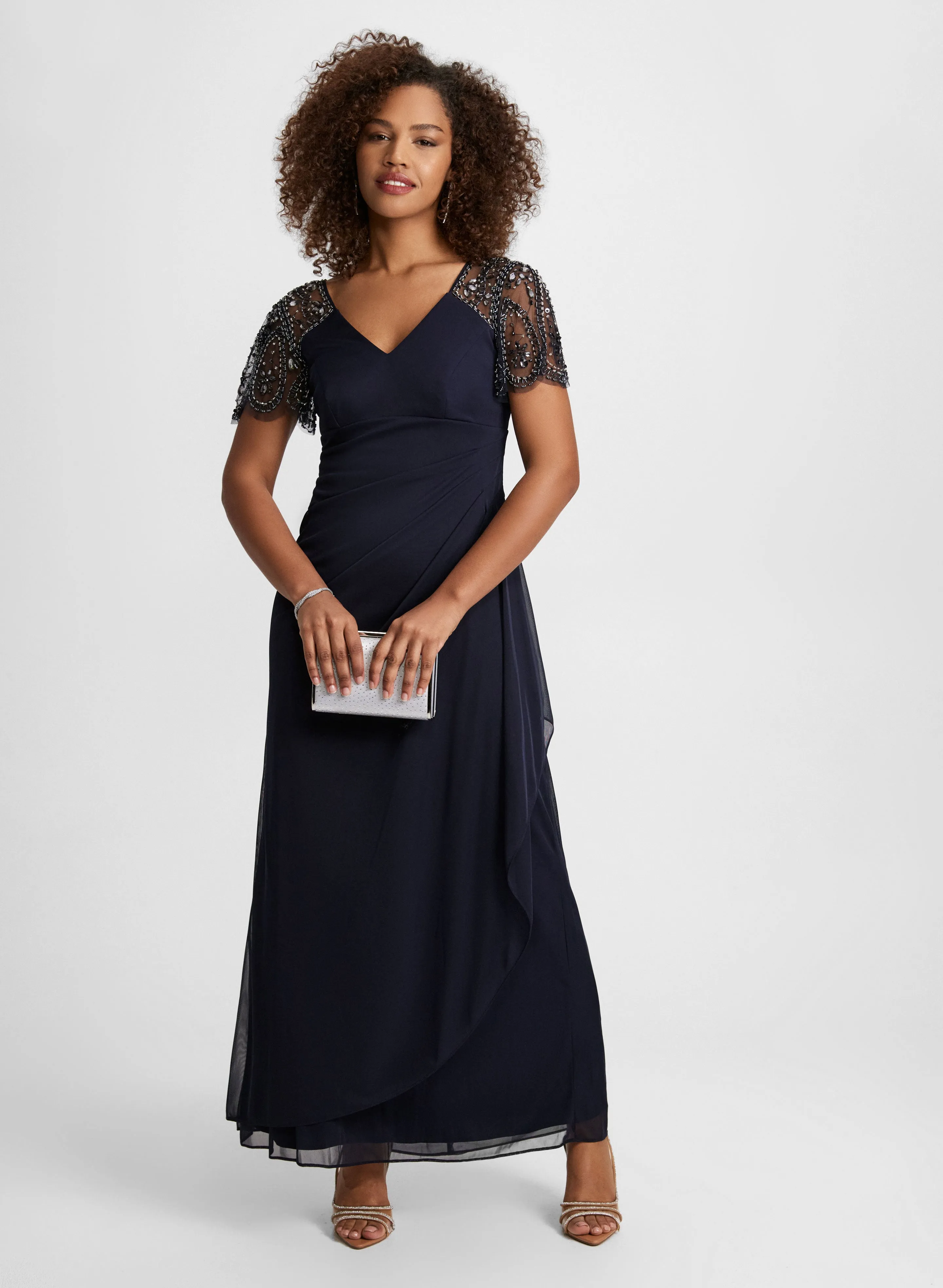 Beaded Mesh Flutter Sleeve Dress sold by Laura