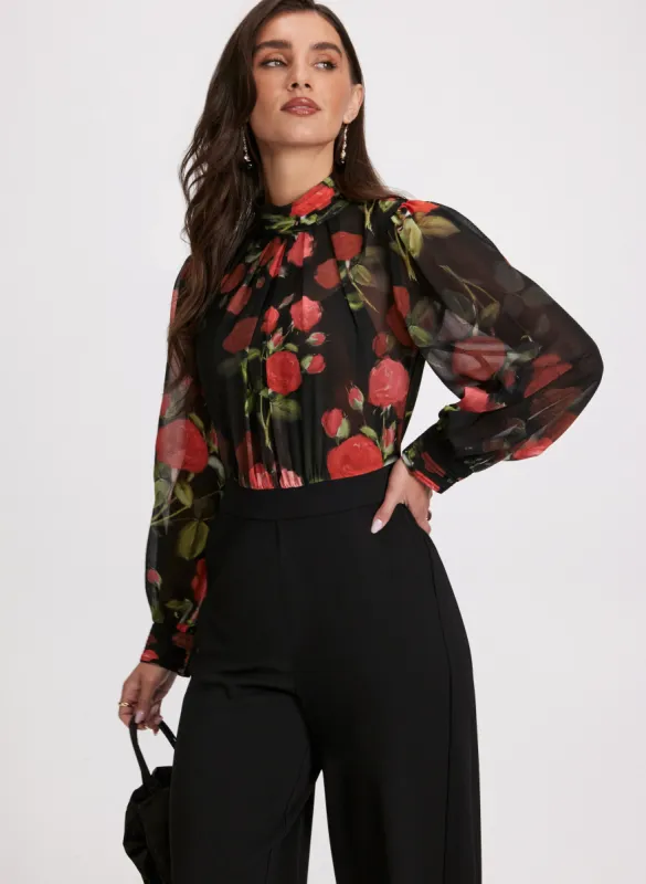 Floral Illusion Jumpsuit sold by Laura