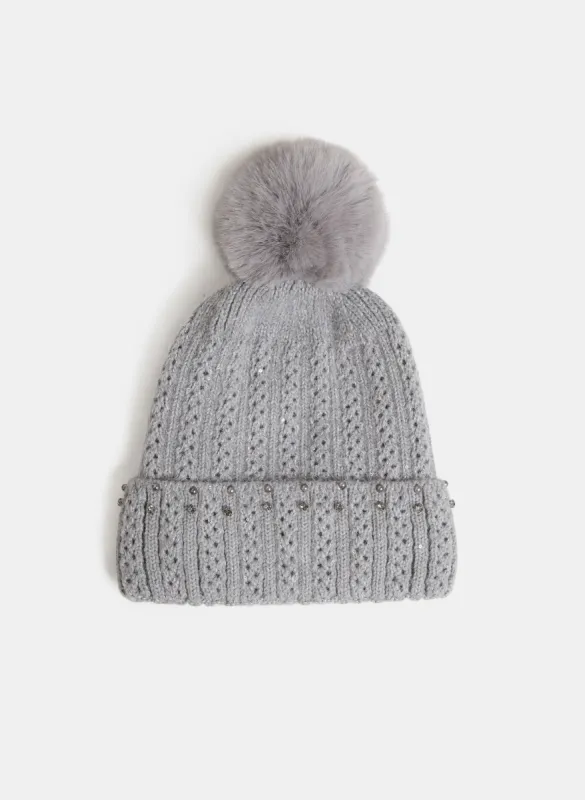 Pom-Pom Knit Tuque sold by Laura