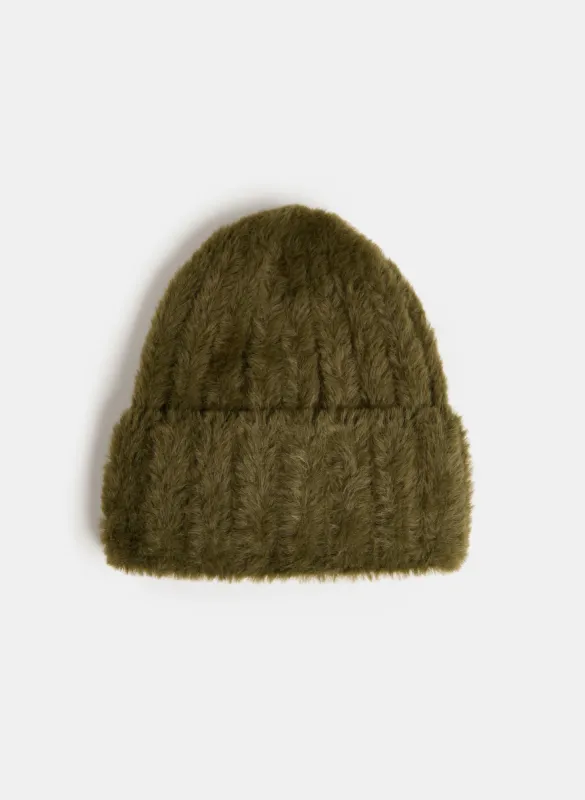 Feather Yarn Tuque sold by Laura