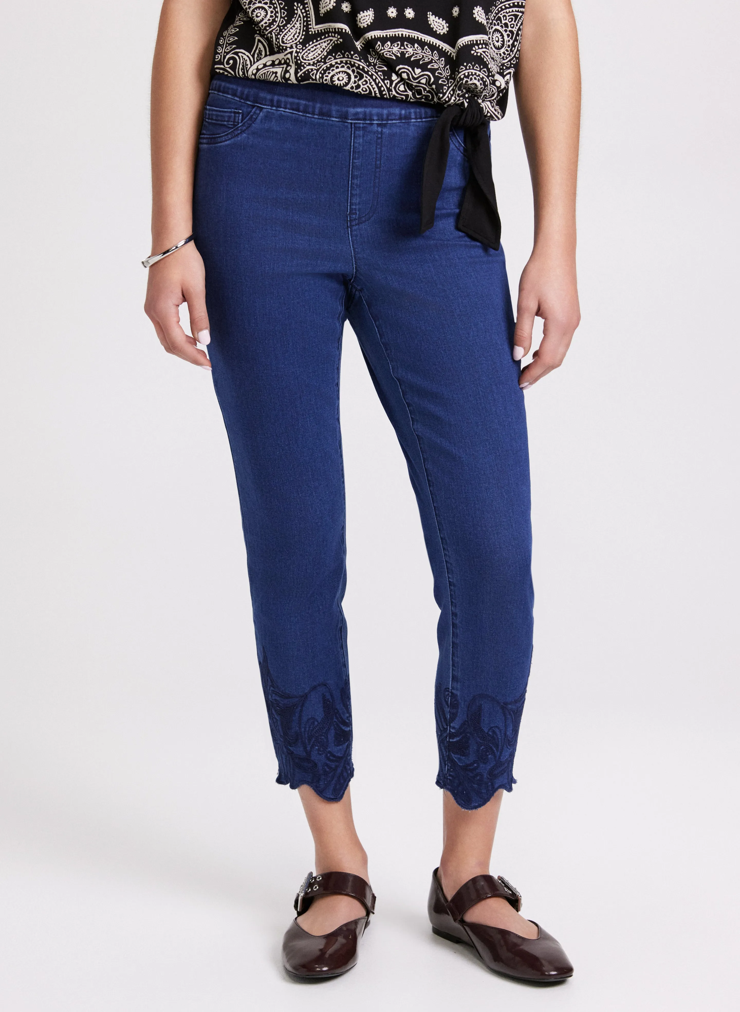 Embroidered Slim-Leg Jeans sold by Laura
