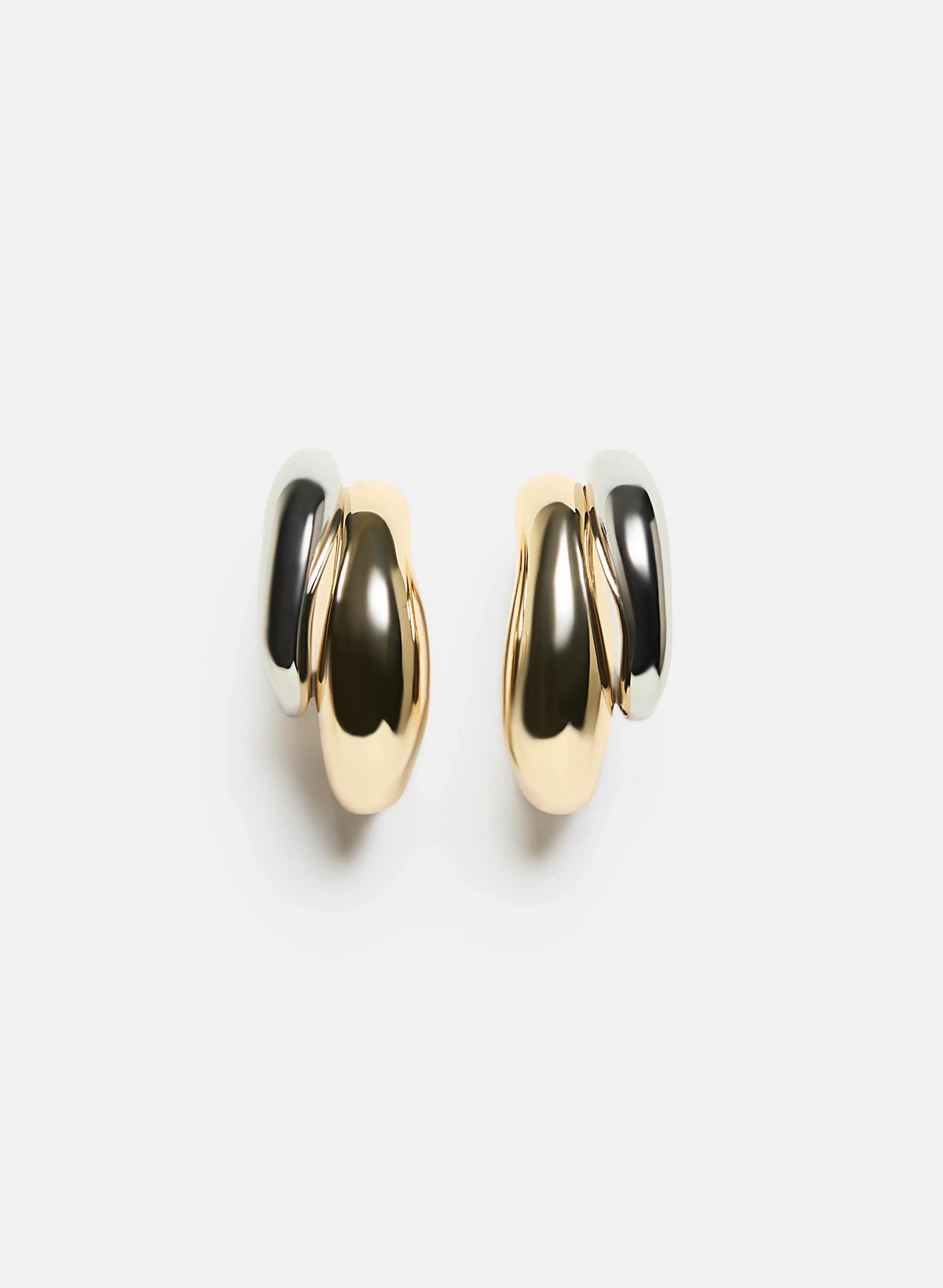 Two-Tone Double Hoop Earrings sold by Laura