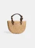 Straw Half-Moon Bag sold by Laura