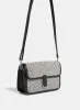 Two-Tone Woven Handbag sold by Laura