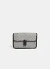 Two-Tone Woven Handbag sold by Laura