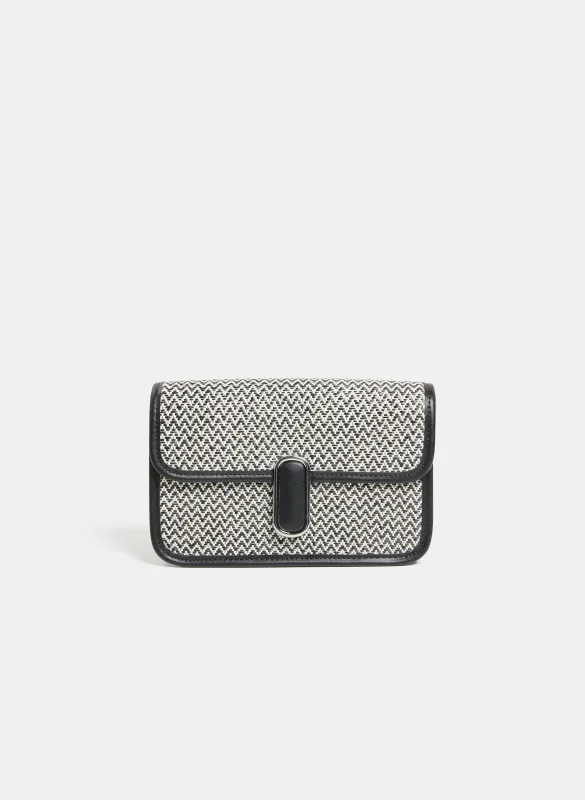 Two-Tone Woven Handbag sold by Laura