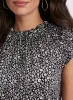 Floral Flutter Sleeve Top sold by Laura