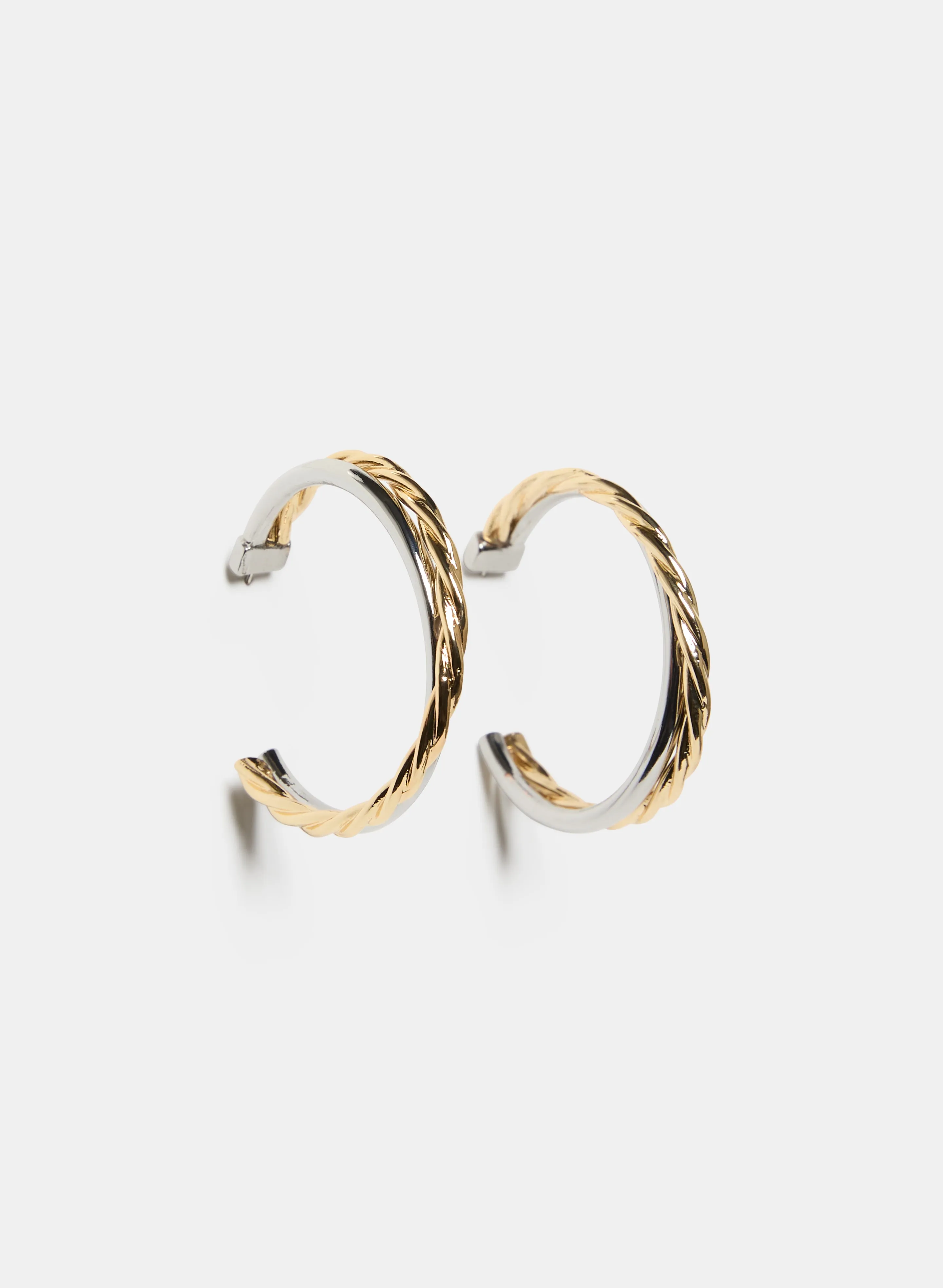 Two-Tone Hoop Earrings sold by Laura