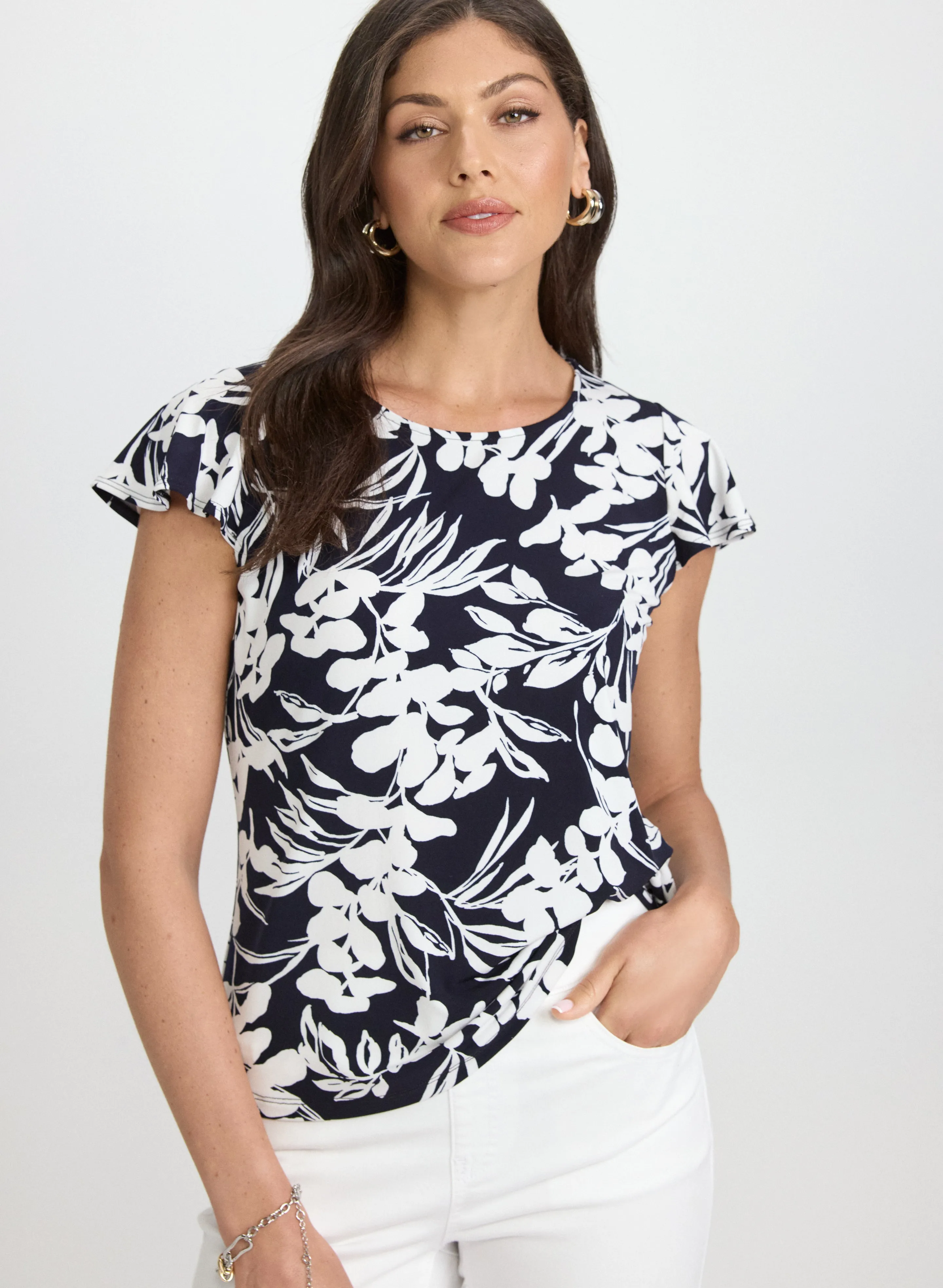 Floral Flutter Sleeve Top sold by Laura
